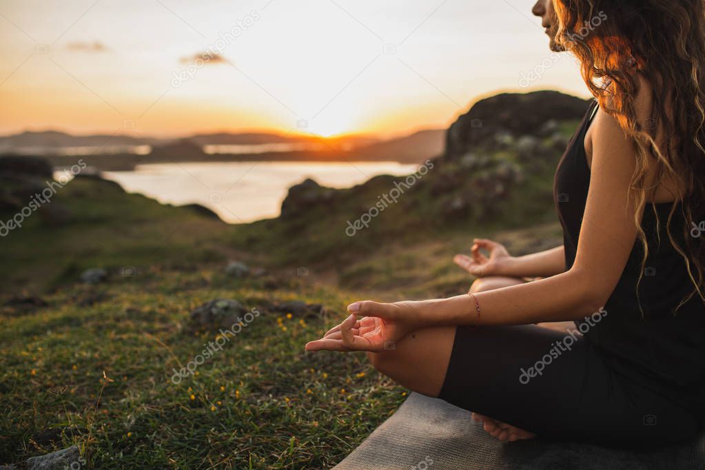 Healthy Lifestyle and Yoga Concept. Close-up hands. Woman do yog