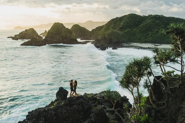 Man and woman looking to each other with love at sunset with ama — Stock Photo, Image