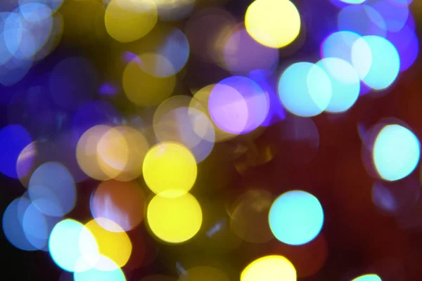 Bokeh of multicolored lights new year Christmas