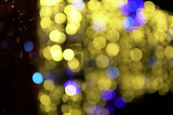 Bunte Weihnachtsbeleuchtung bokeh Neujahr Urlaub — Stockfoto