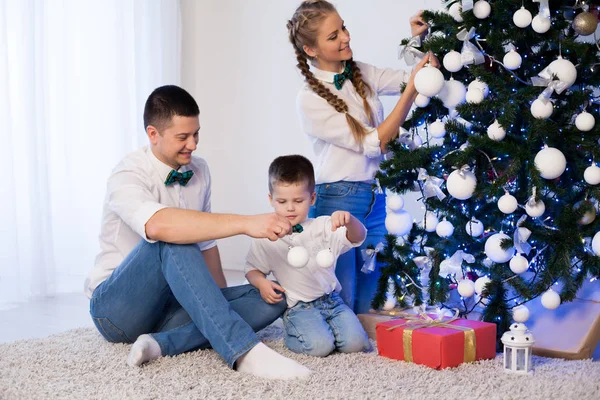Mom dad and little son Christmas new year and Christmas gifts — Stock Photo, Image