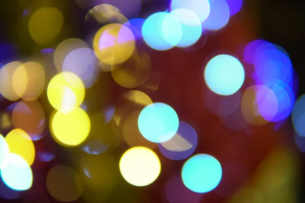 Vánoční světla Bokeh Garland novoroční svátky různé barvy — Stock fotografie