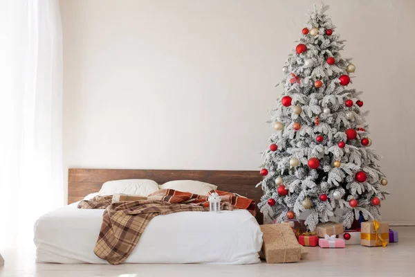 Winter Christmas background bed bedroom tree holiday gifts new year — Stock Photo, Image