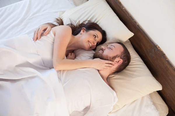 A man and a woman woke up in the morning — Stock Photo, Image