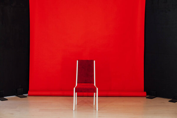 red black background room and one chair