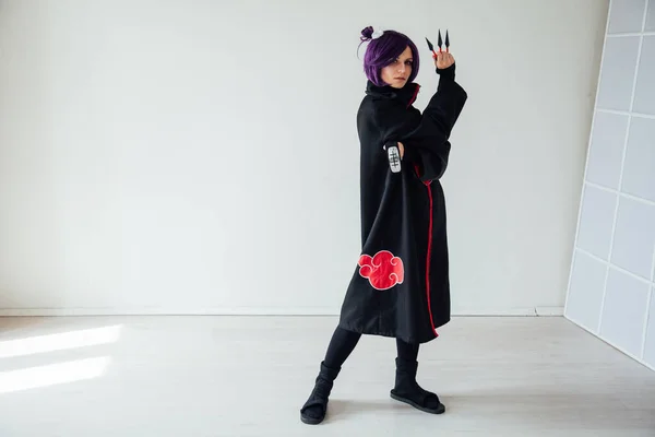 Girl cosplayer with purple hair anime Japan — Stock Photo, Image