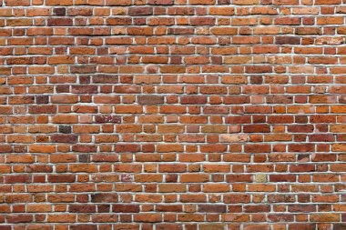 Doğal eski vintage Close-up kırmızı kahverengi değil sıvalı katı tuğla duvar yıpranmış. Soyut kopya alan arka plan, örmek, inşaat ve duvar kavramı.