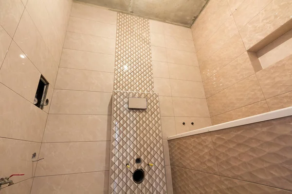 Unfinished Reconstruction Bathroom Toilet Light Beige Geometric Ceramic Tiles Installed — Stock Photo, Image