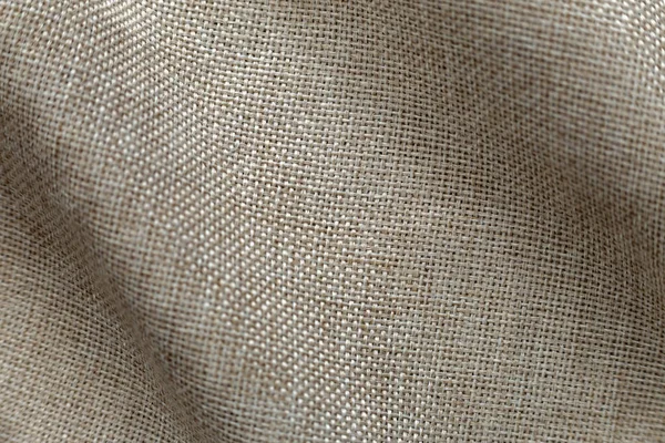 Gray beige linen canvas surface background. Sackcloth design, ecological cotton textile, fashionable woven flex burlap.