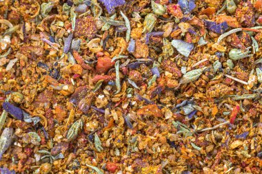 Soyut doğal parlak turuncu renkli kopya alan arka plan dokulu. Darı, meşe, farklı tahıl küçük parçacıklar, balık ve gıda papağan.