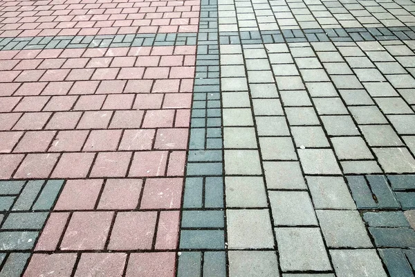 Stone pavement in perspective. Granite cobblestone pavement tile