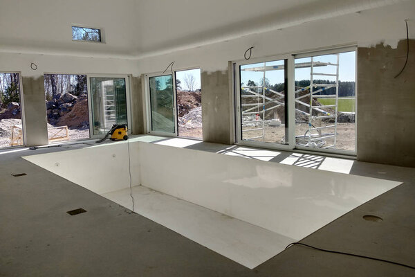Interior of a house with big swimming pool under renovation work
