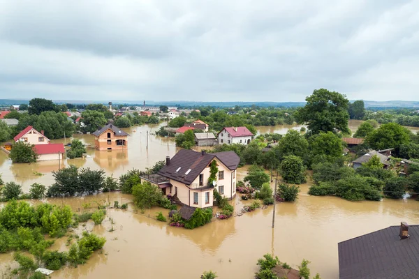 Aerial view of flooded houses with dirty water of Dnister river in Halych town, western Ukraine.