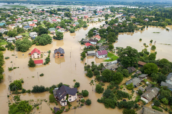 Aerial view of flooded houses with dirty water of Dnister river in Halych town, western Ukraine.