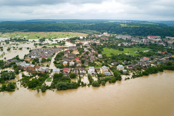 Aerial view of flooded houses with dirty water of Dnister river in Halych town, western Ukraine.