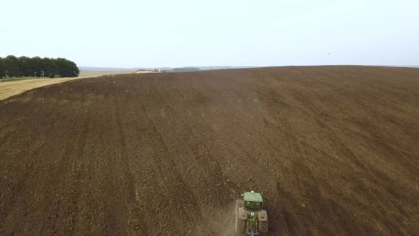 Aerial Footage Tractor Plowing Black Agriculture Farm Field Harvesting Autumn — Stock Video
