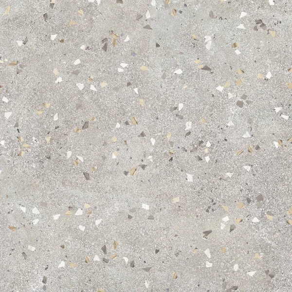 Beton dokusunda beyaz granit taşlar var.