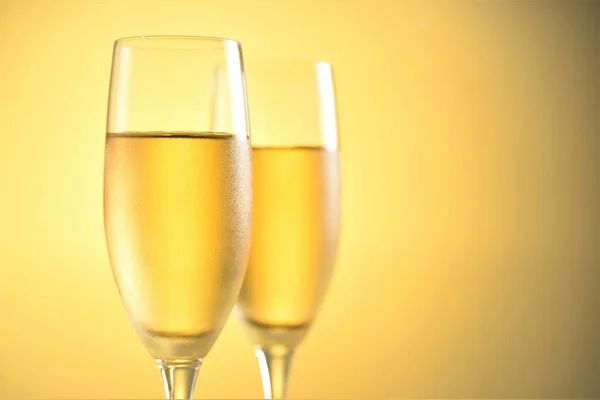 Cold Champagne Glasses Closeup Yellow Color Background — Stock Photo, Image