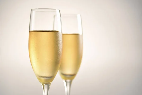 Cold Champagne Glasses Closeup White Background — Stock Photo, Image