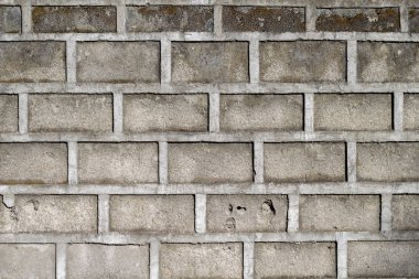 Gri tuğla duvar closeup fotoğraf arka plan için. Beton yüzey. Kaba gri taş tuğla. Duvar duvar büyük blok yaptı. Rustik taş doku. Endüstriyel taş tuğla. Katı koruma kavramı
