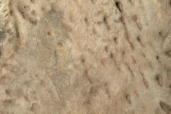 平滑的黄石纹理照片 古老的石头背景 风化岩石浮雕 风化砂岩表面特写 苦恼的石材质地 天然地板材料 蹩脚岩石形成 — 图库照片