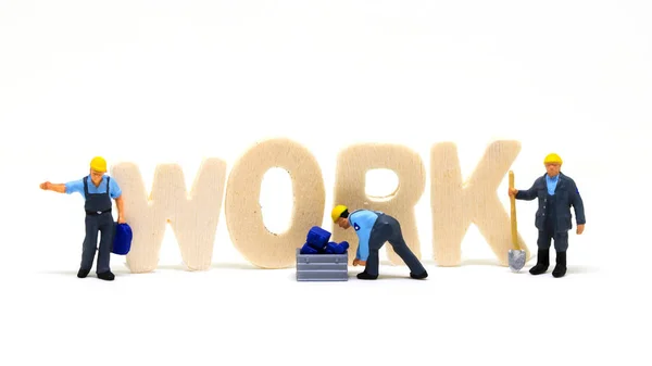 Werkwoord Houten Letters Arbeidersmodellen Witte Achtergrond Blauw Kraag Werk Concept — Stockfoto