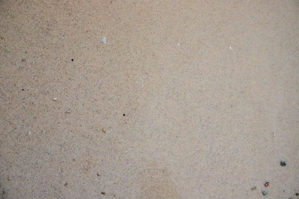 Praia de areia plana. Seashore areia textura praia. Oceano costa vista superior foto. Fundo natural à beira-mar. Areia lisa — Fotografia de Stock