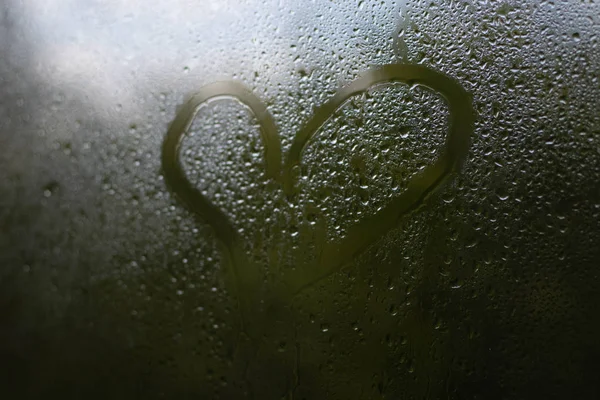 The texture of the rain on the glass, love