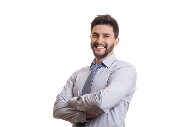 Mavi klasik gömlek ve beyaz arka plan üzerinde izole kravat emin genç gülümseyen işadamı portresi