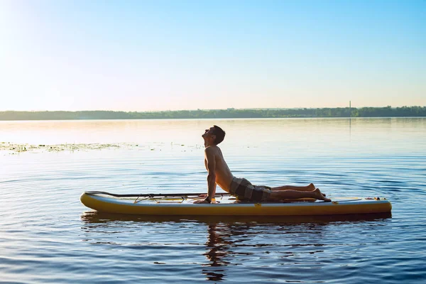 Man Practicing Yoga Sup Board Sunrise Large River Stand Paddle — Stock Photo, Image