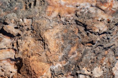 Taş doku kahverengi tonlarında. Ayrışma sonra kaya parçası.