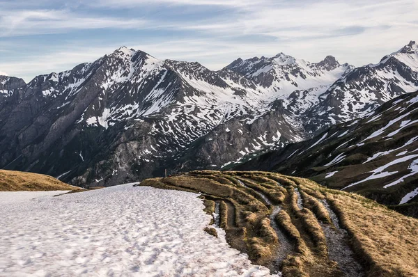 Snow covered mountains in the summer in the French alps