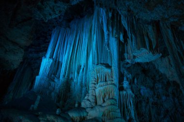 beautiful stalactites, clamouse cave in saint guilhem le desert, herault, france clipart
