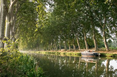 The Canal du Midi in the morning, in Beziers, southern France clipart