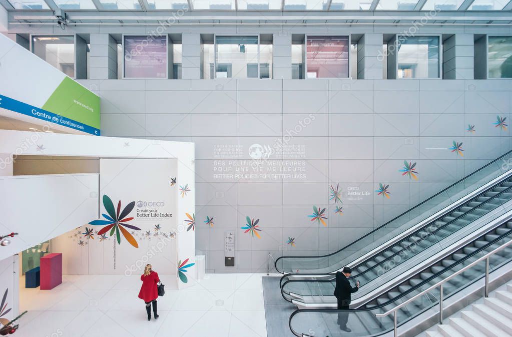 PARIS, FRANCE - DECEMBER 13, 2016: OECD(Organisation for Economic Co-operation and Development)interior with Christmas tree. The OECD is founded in 1961 to stimulate economic progress and world trade