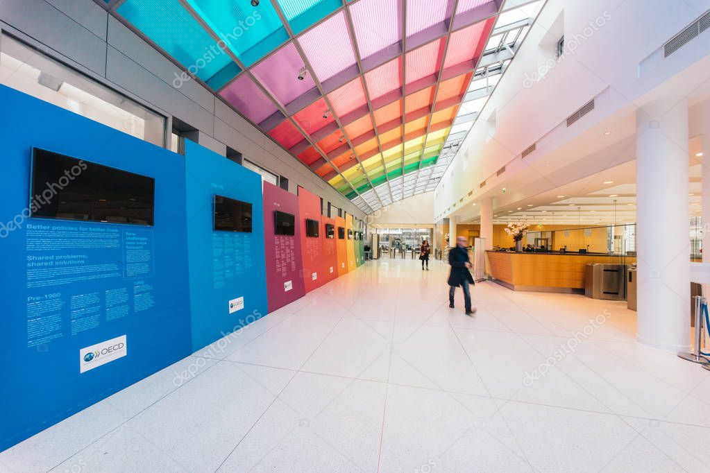 PARIS, FRANCE - DECEMBER 13, 2016: OECD(Organisation for Economic Co-operation and Development)interior with Christmas tree. The OECD is founded in 1961 to stimulate economic progress and world trade