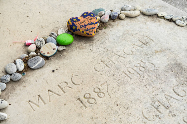 SAINT PAUL DE VENCE, FRANCE - MAY 13, 2016: Marc Chagall's grave. Marc Zakharovich Chagall was a Russian-French artist. An early modernist, he was associated with several major artistic styles