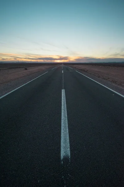 Desert Highway at dusk near Ouarzazate, Morocco