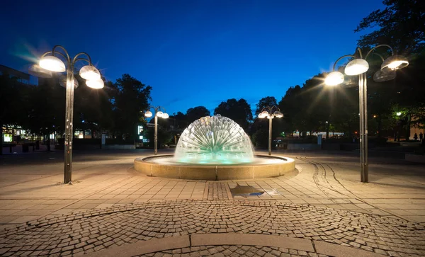 Fountain inspired from dandelion, sparkling water to the sides, Oslo, Norway