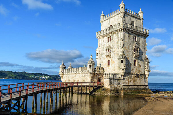Torre de Belem - famous landmark of Lisbon , Portugal at sunrise