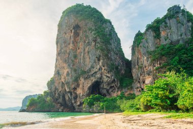 Tropical sandy beach Phra Nang with rock formations with nobody, Railay Bay, Krabi, Thailand. Popular touristic vacation holiday destination.