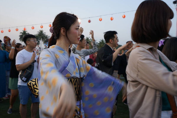 Selangor, Malaysia - 20 July 2019: Bon Odori Dance Performance in 43rd Bon Odori Festival 2019 at Panasonic National Sport Complex Shah Alam. Image contain certain grain or noise and soft focus.