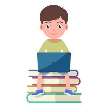 Kitap ve bir dizüstü bilgisayarda nişanlı işleri çocuk oturur