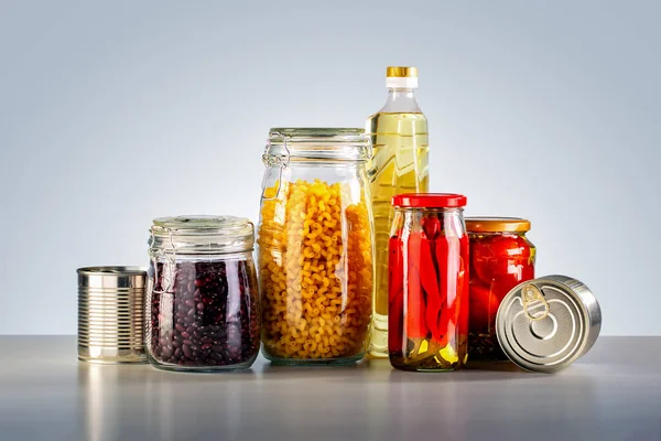Various Canned Food Pasta Bean Oil Table — Stock Photo, Image
