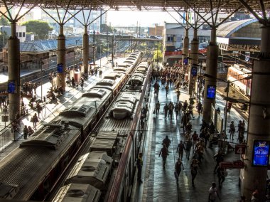 Sao Paulo, Brazil, June, 19, 2018. People wait on platform of Bras Station in Sao Paulo. This station serve to Subway and CPTM clipart