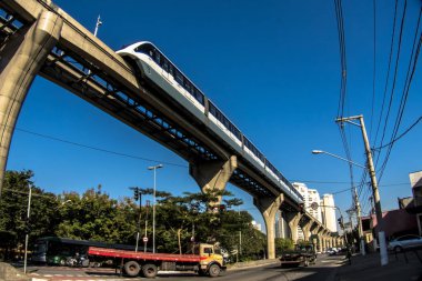 Sao Paulo, Brazil, June 20, 2018. Monorail train moves on railway girder in east  region of Sao Paulo clipart