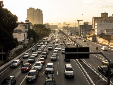 Sao Paulo, SP, Brazil, June 26, 2018. Heavy traffic on the East-West connection, Radial Leste Avenue, at morning day, in downtown Sao Paulo. clipart