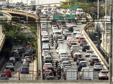 Sao Paulo, SP, Brazil, July 06, 2018. Heavy traffic on the East-West connection, Radial Leste Avenue, at morning day, in downtown Sao Paulo. clipart