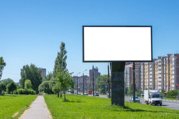 empty or blank advertisement billboard on the background of a building, to put your design on it. mock-up