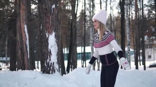 Girl skates on a skating rink in a winter forest. slow motion — Stock Video